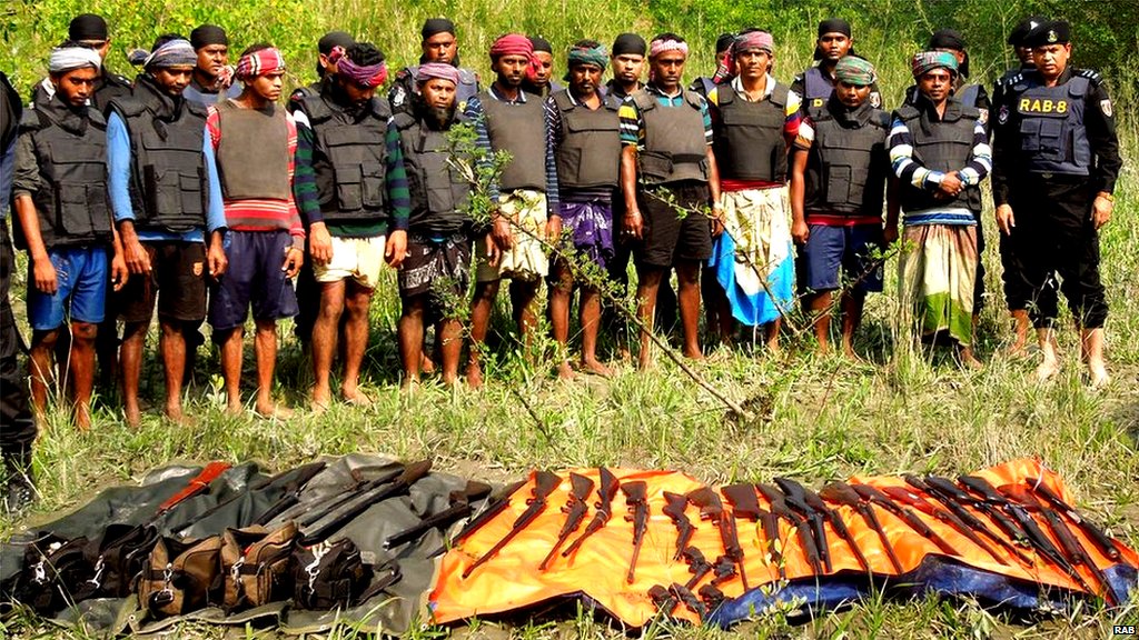 Bangladeshi pirates shown with the guns they have.